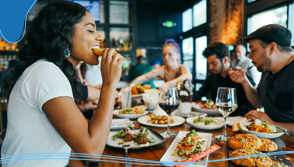 Young people eating together