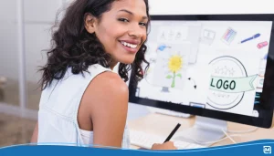 Woman designing a logo on a computer