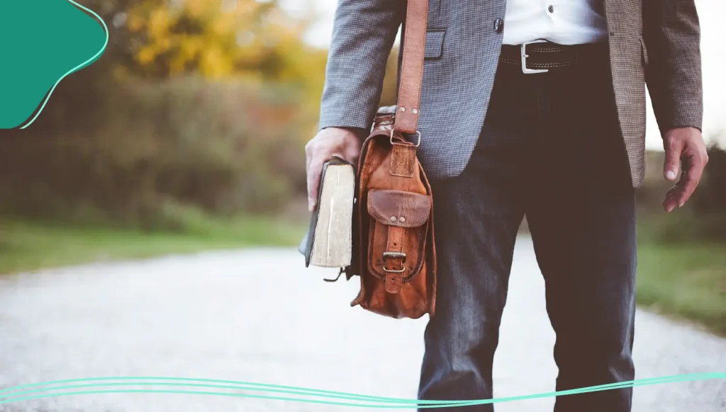 Someone carrying a large satchel.