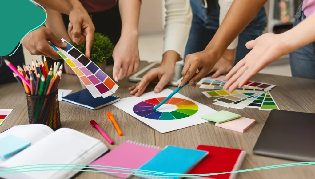 A group choosing colors for a business card design 