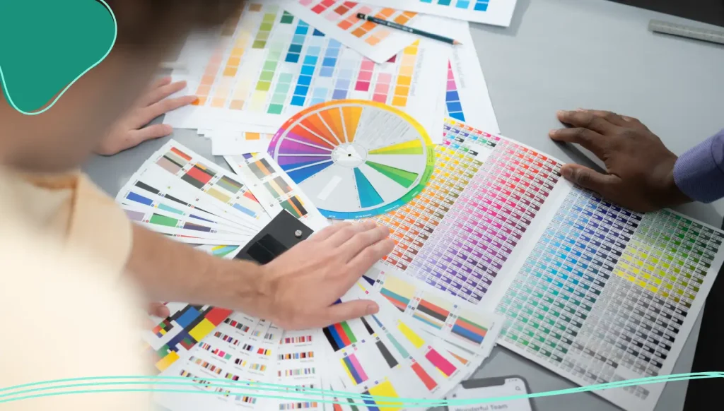 People looking at color wheels for business card printing 