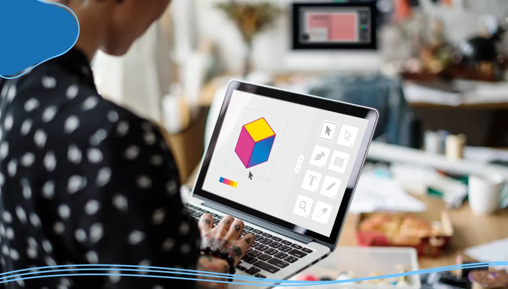 Person designing a geometric logo on a laptop